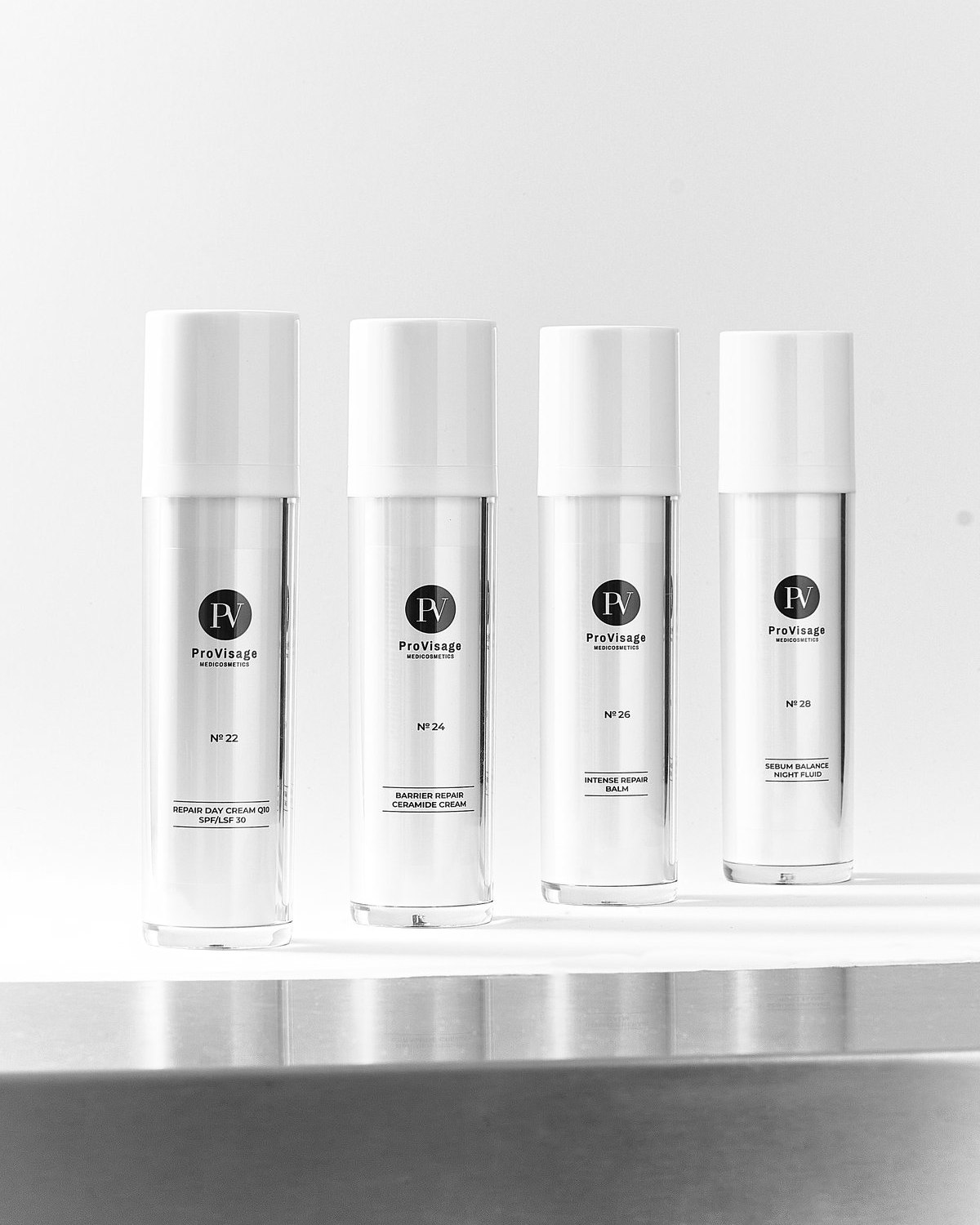 Skincare product lineup, four bottles