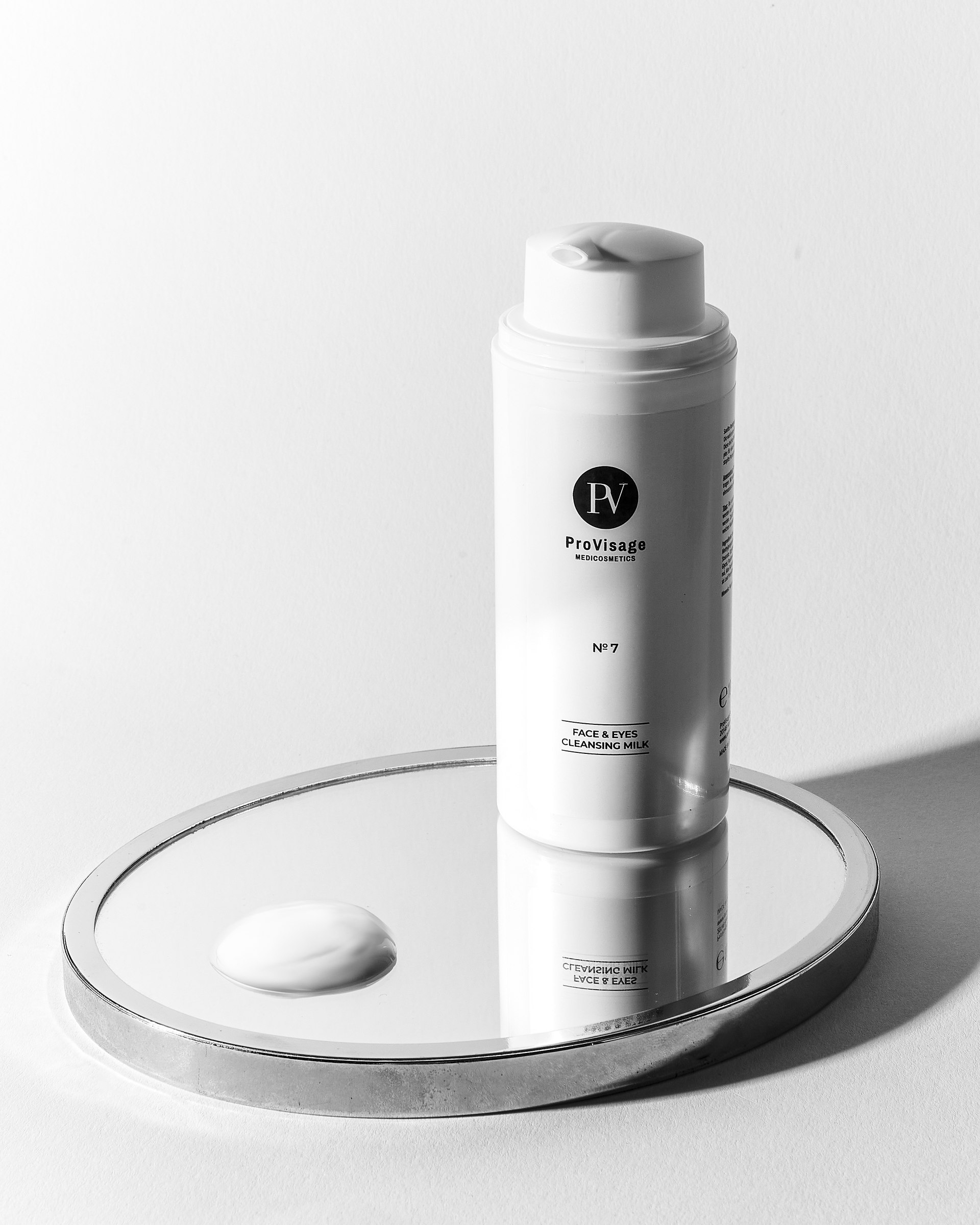 Skincare product on a mirror tray, texture detail