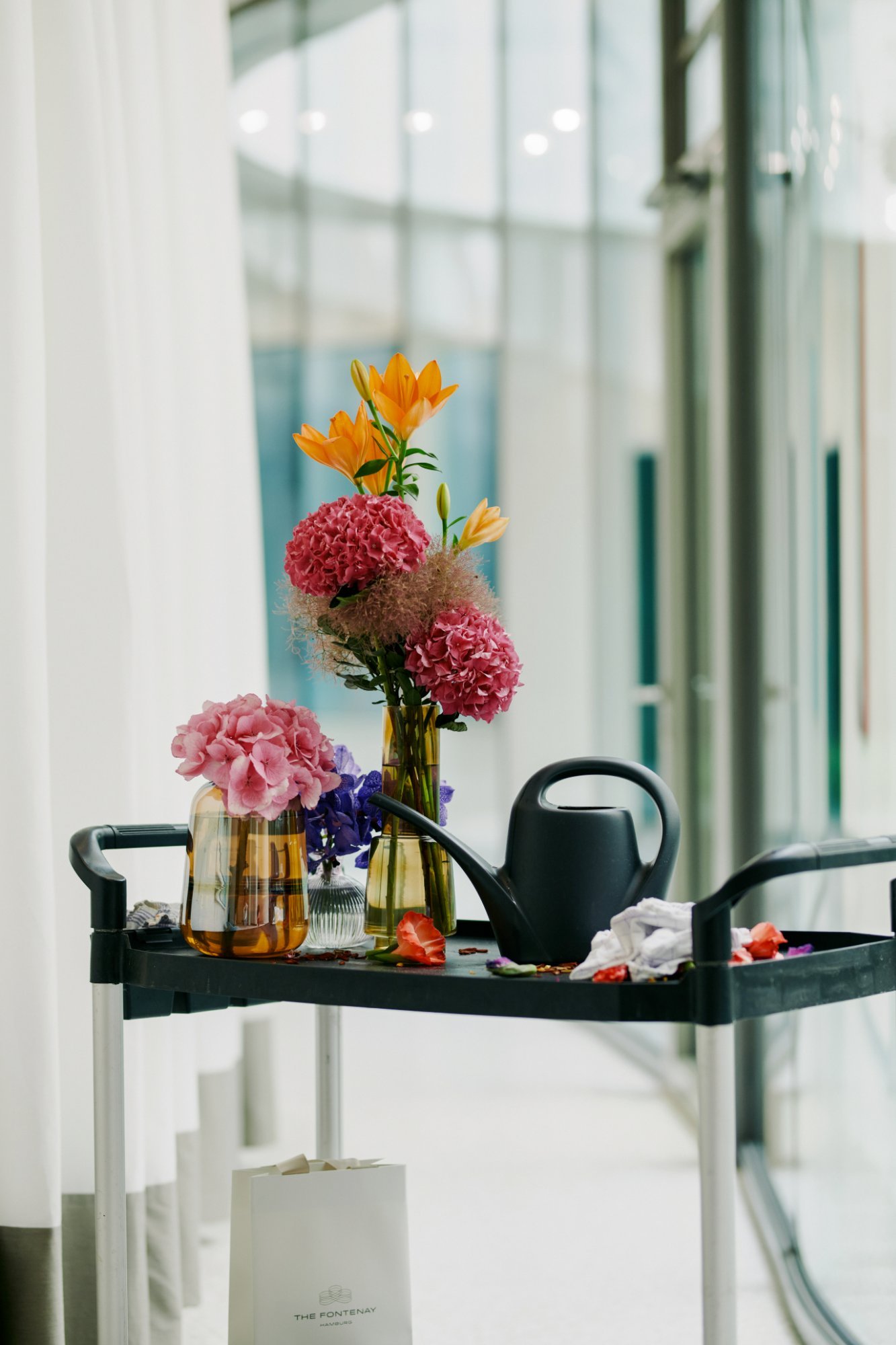 Florist's cart with flower arrangements