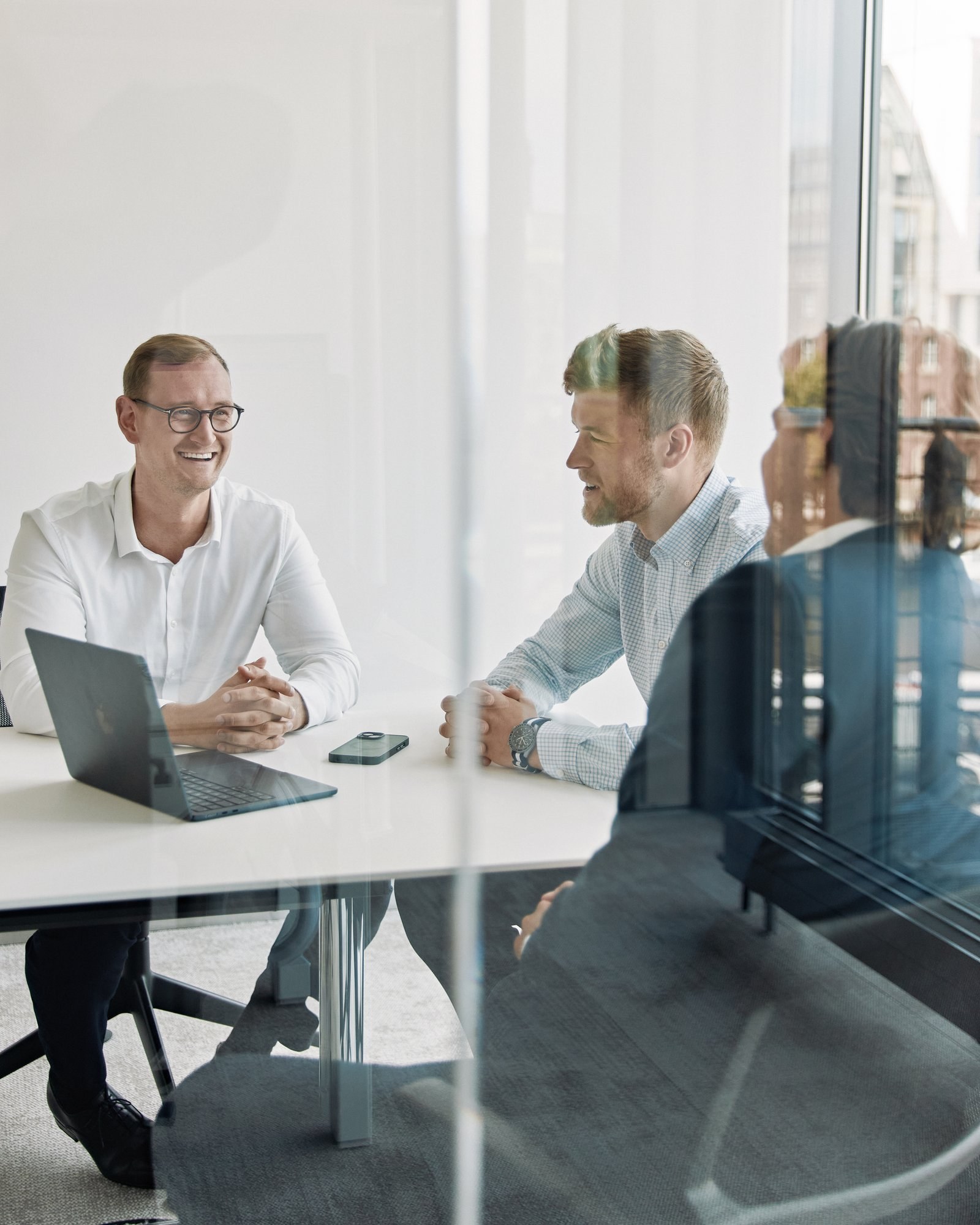 Meeting through glass partition