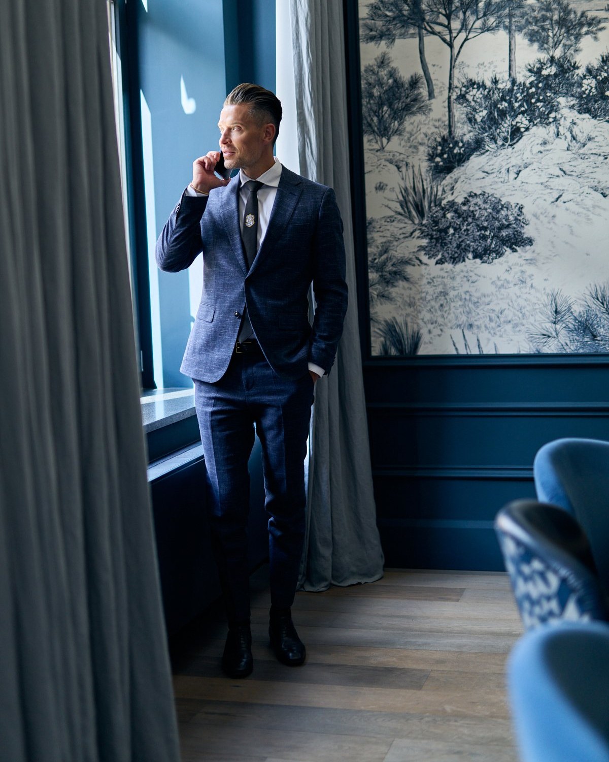 Office portrait, on the phone, window view