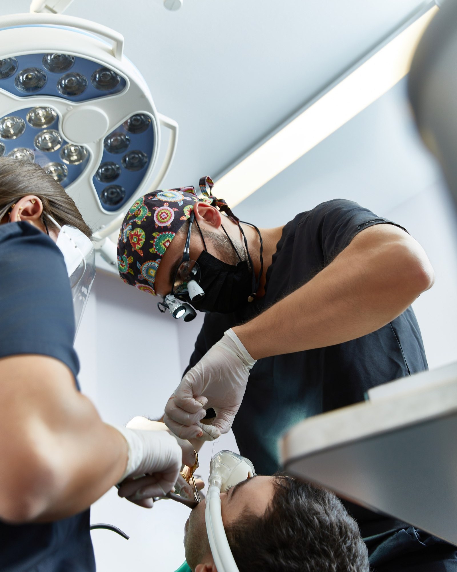 Dental surgery, procedure in progress