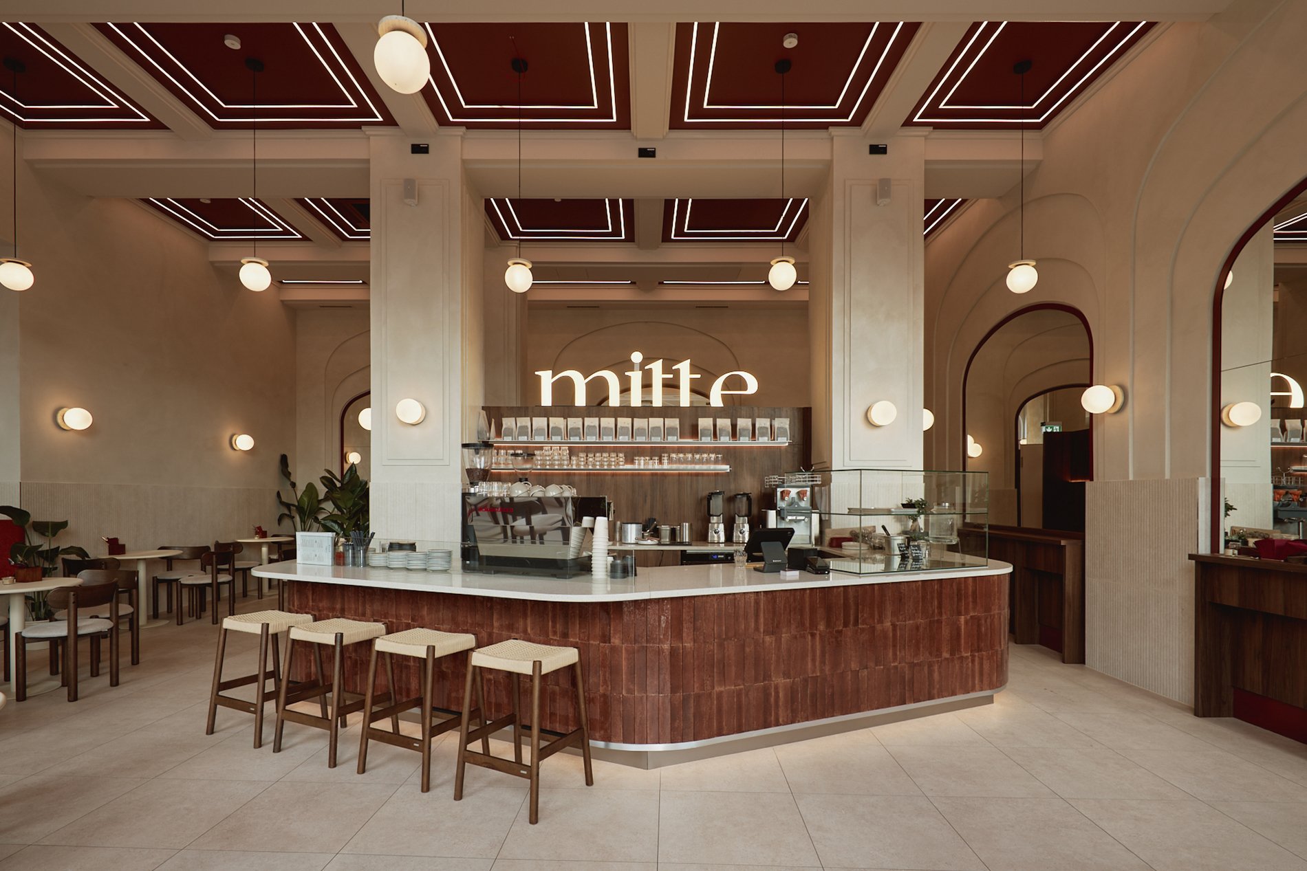 Mitte cafe interior, arched coffered ceiling and brick counter