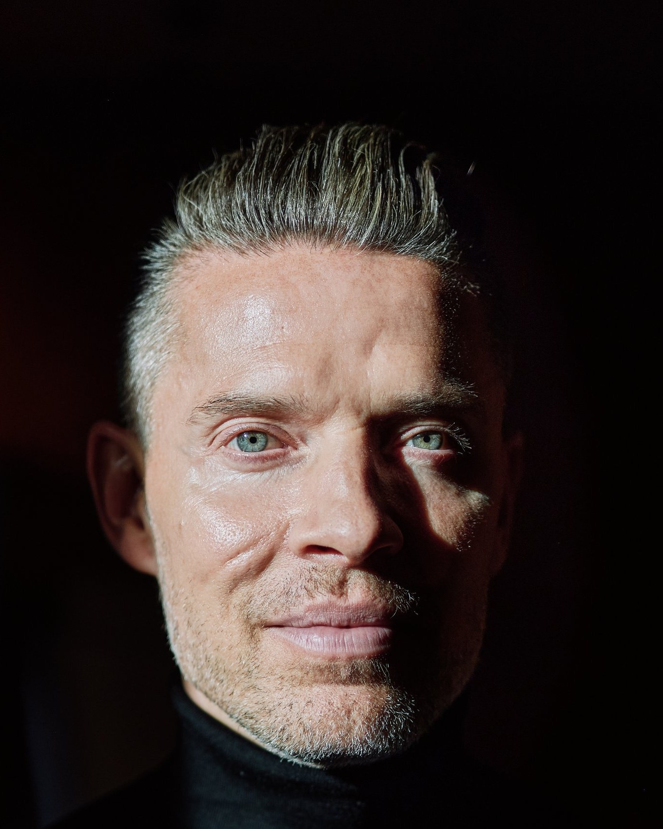 Signature portrait, close-up dramatic light