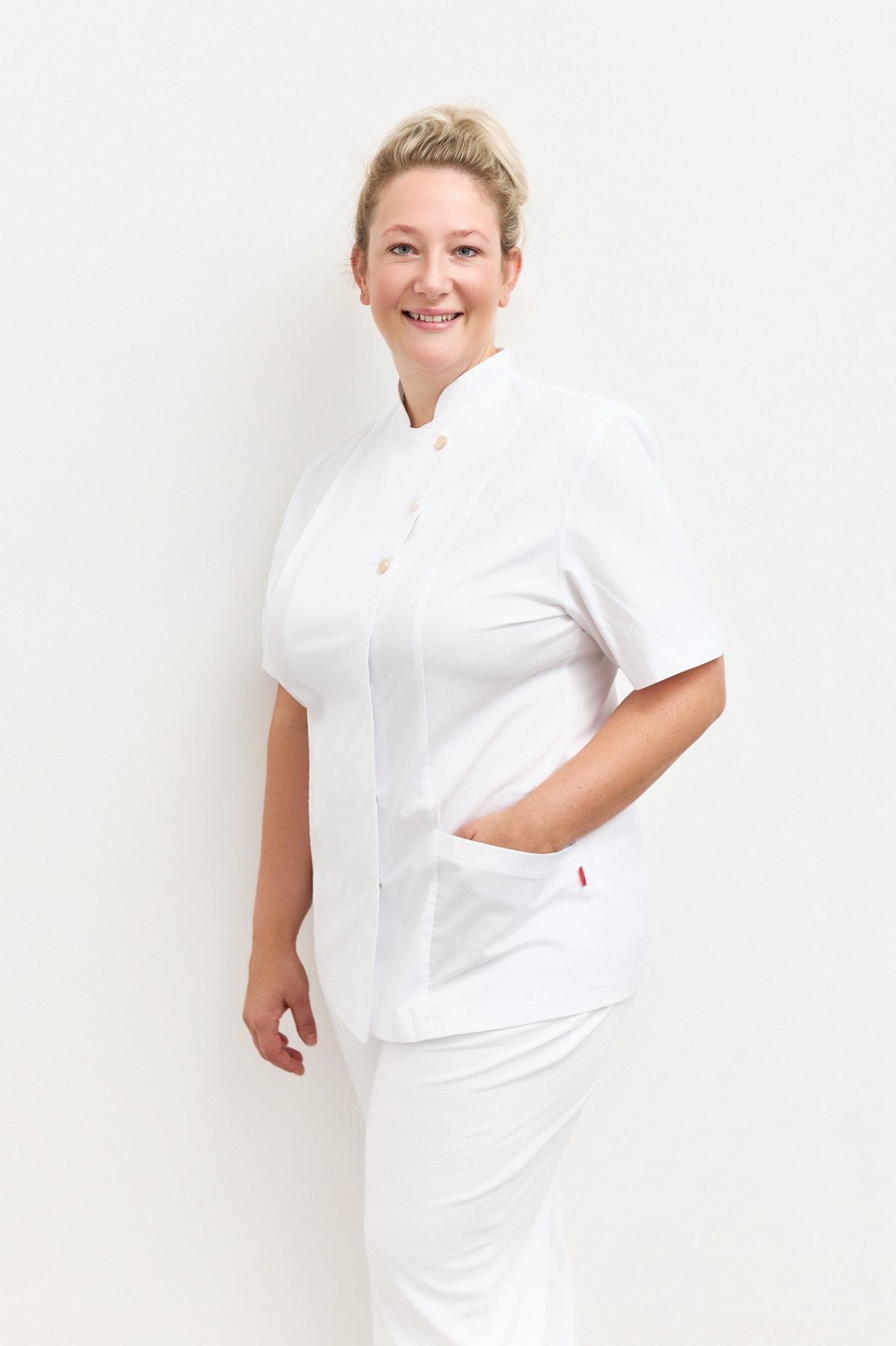 Studio portrait, white uniform