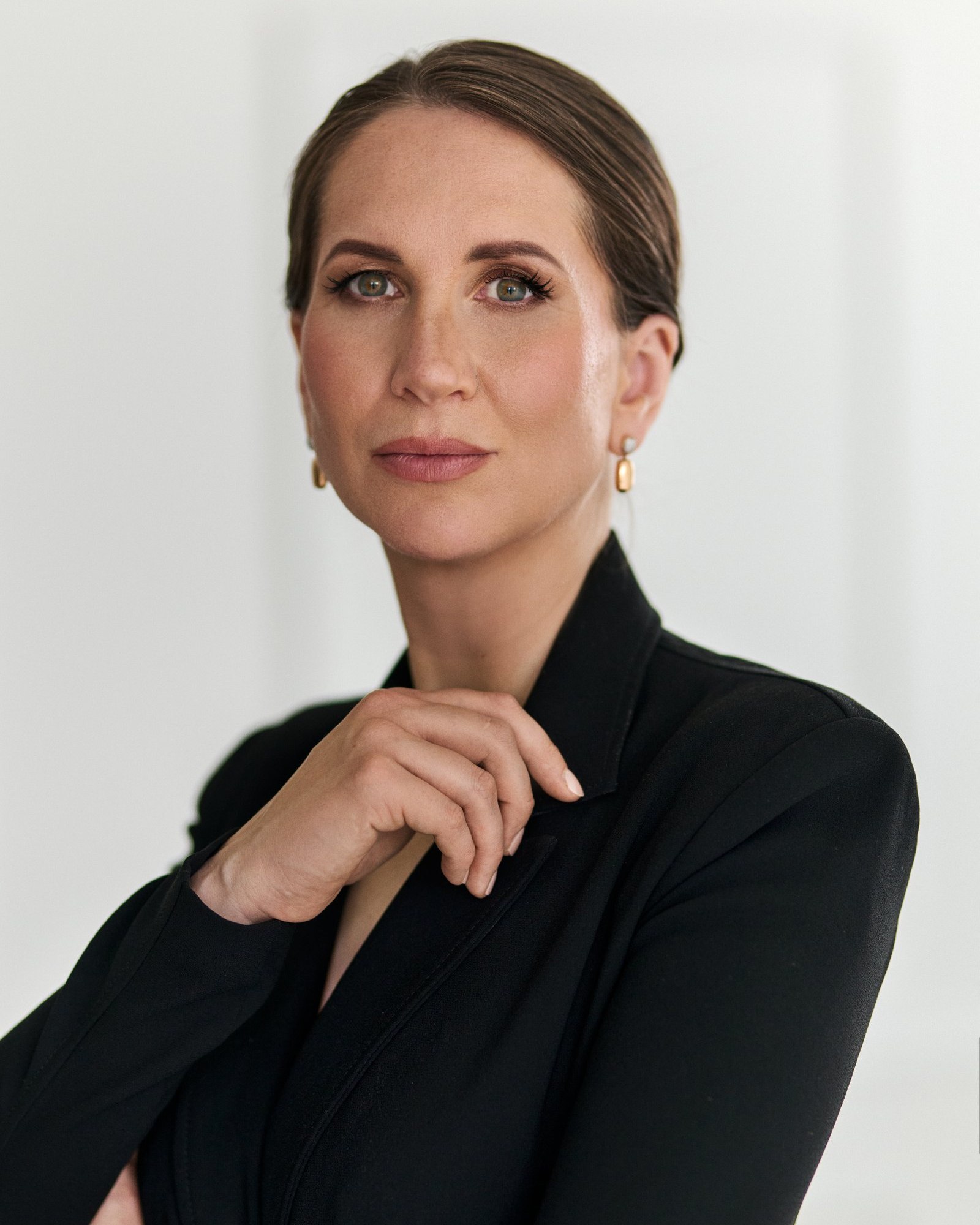 Studio portrait, close-up, arms crossed